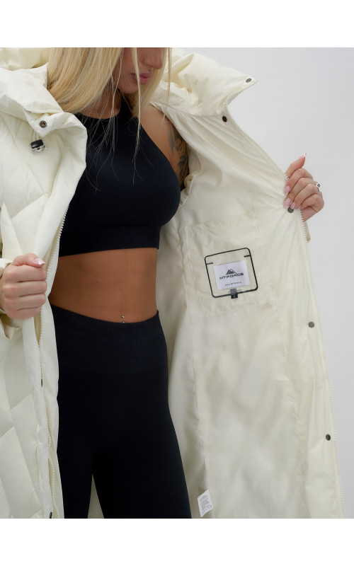 Длинный зимний пуховик с капюшоном для женщин.